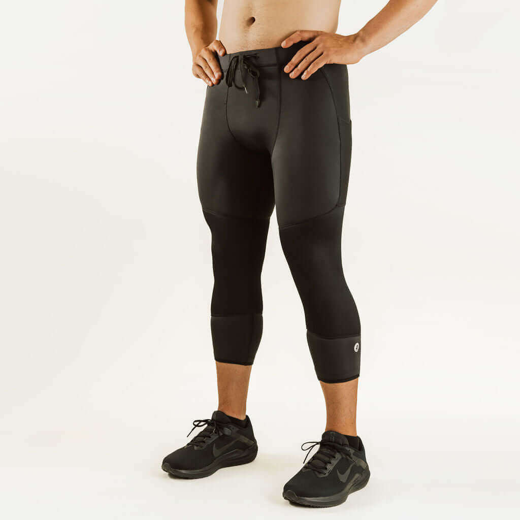 Black 7/8 thermal base layer leggings with drawstring waist and knee support panels