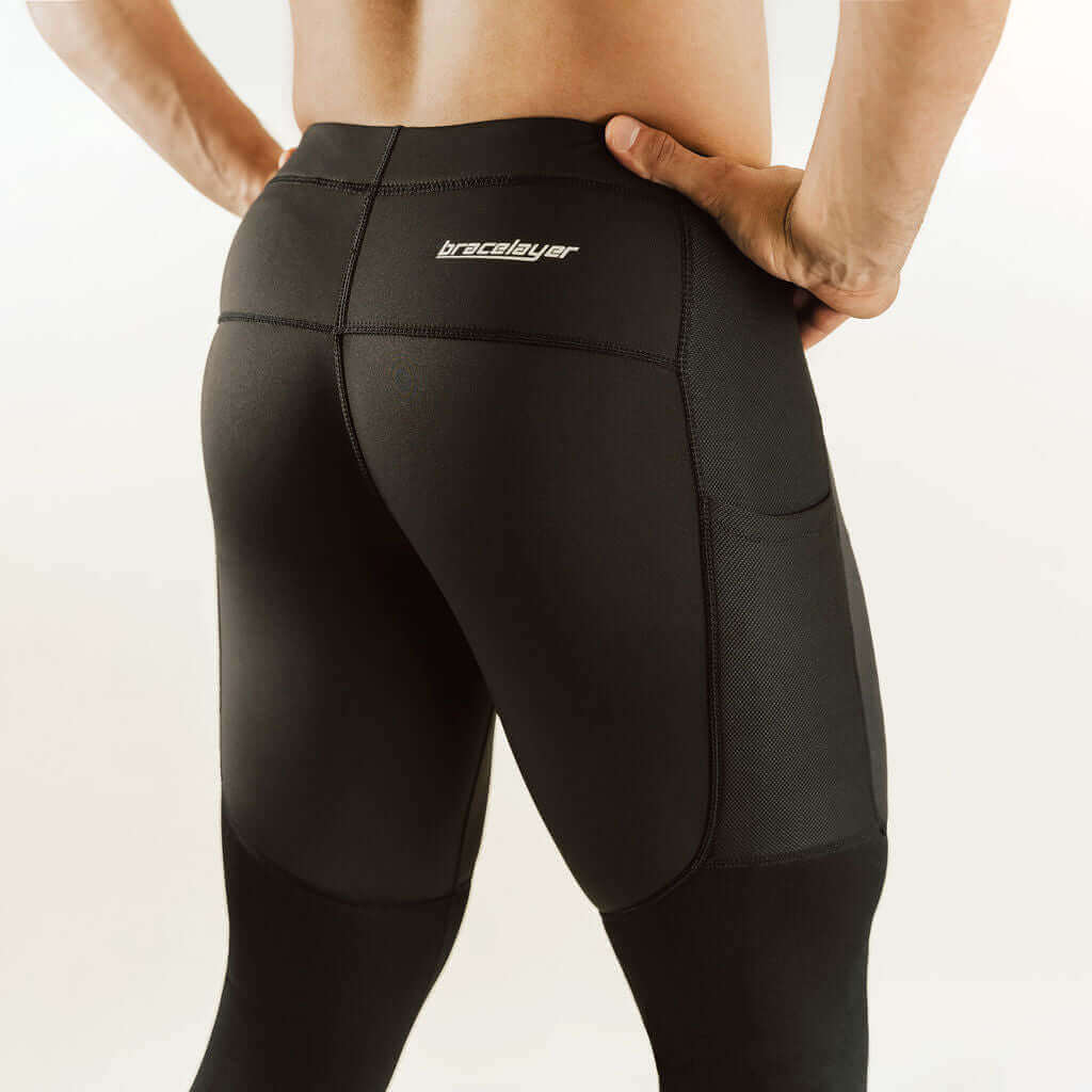 Black 7/8 thermal base layer leggings with knee support panels and contoured seams