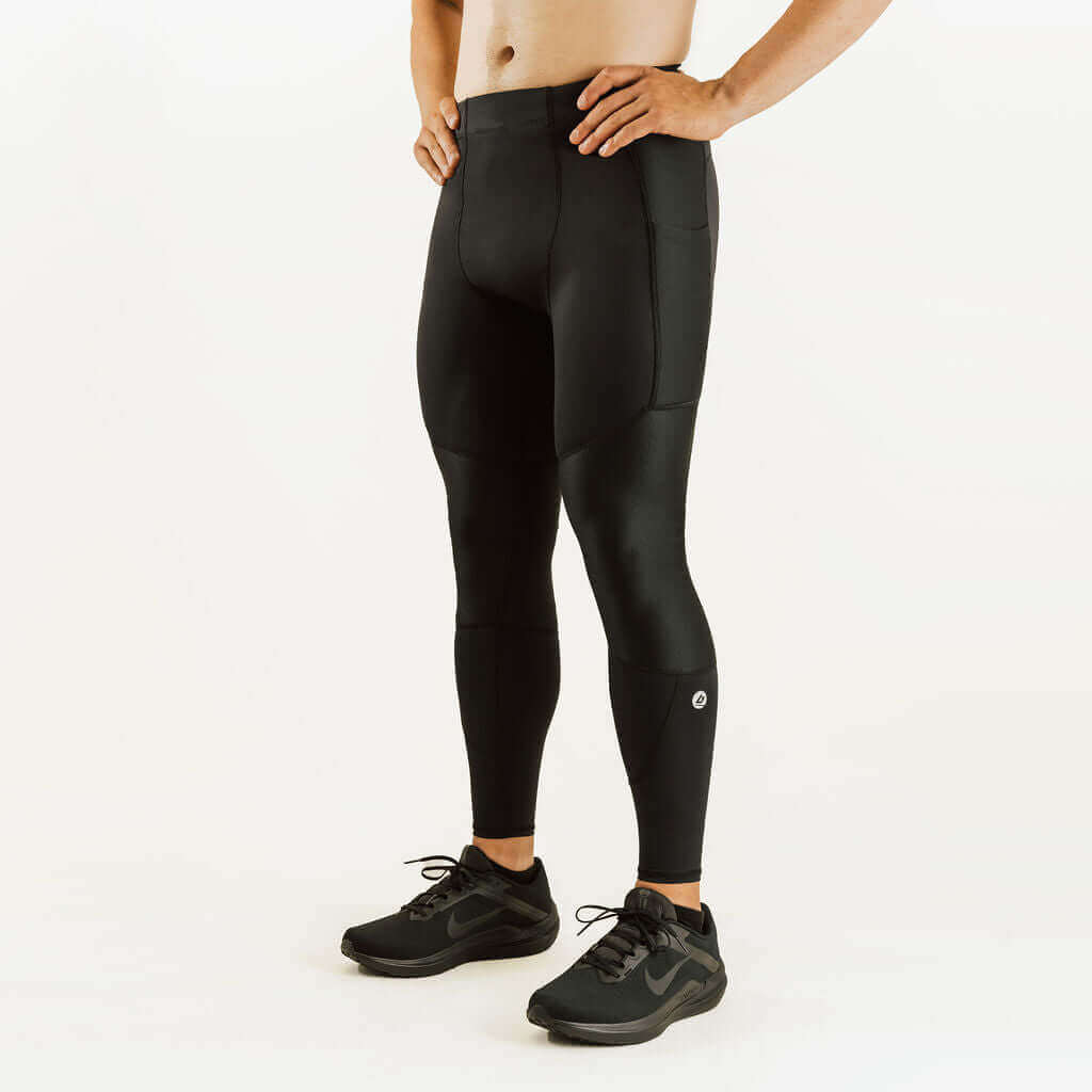 Men's knee support compression pants in dark color, full-length with knee support