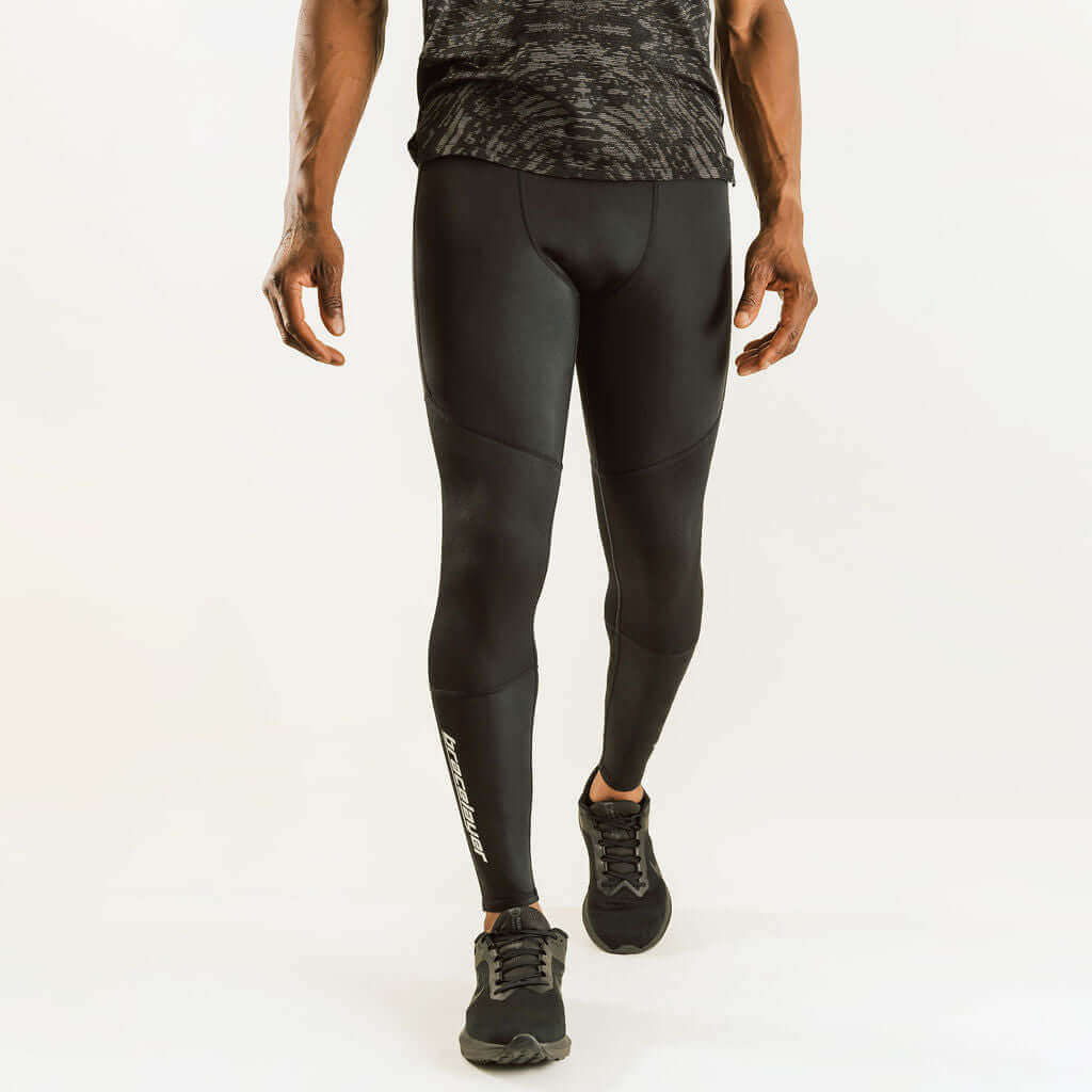 Black knee support compression pants, full length with calf logo and contoured fit.