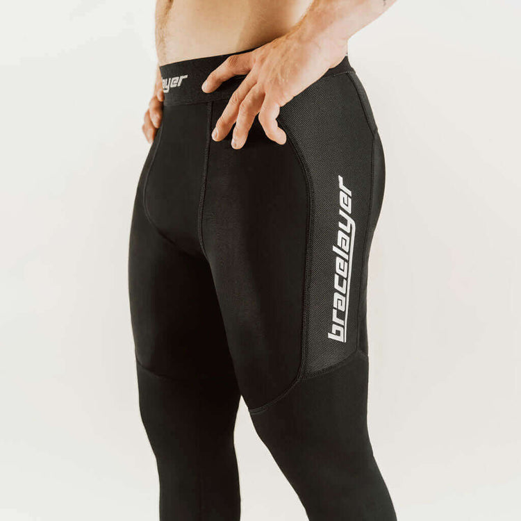KXV 7/8 knee support compression pants, black, curved side panel and vertical logo