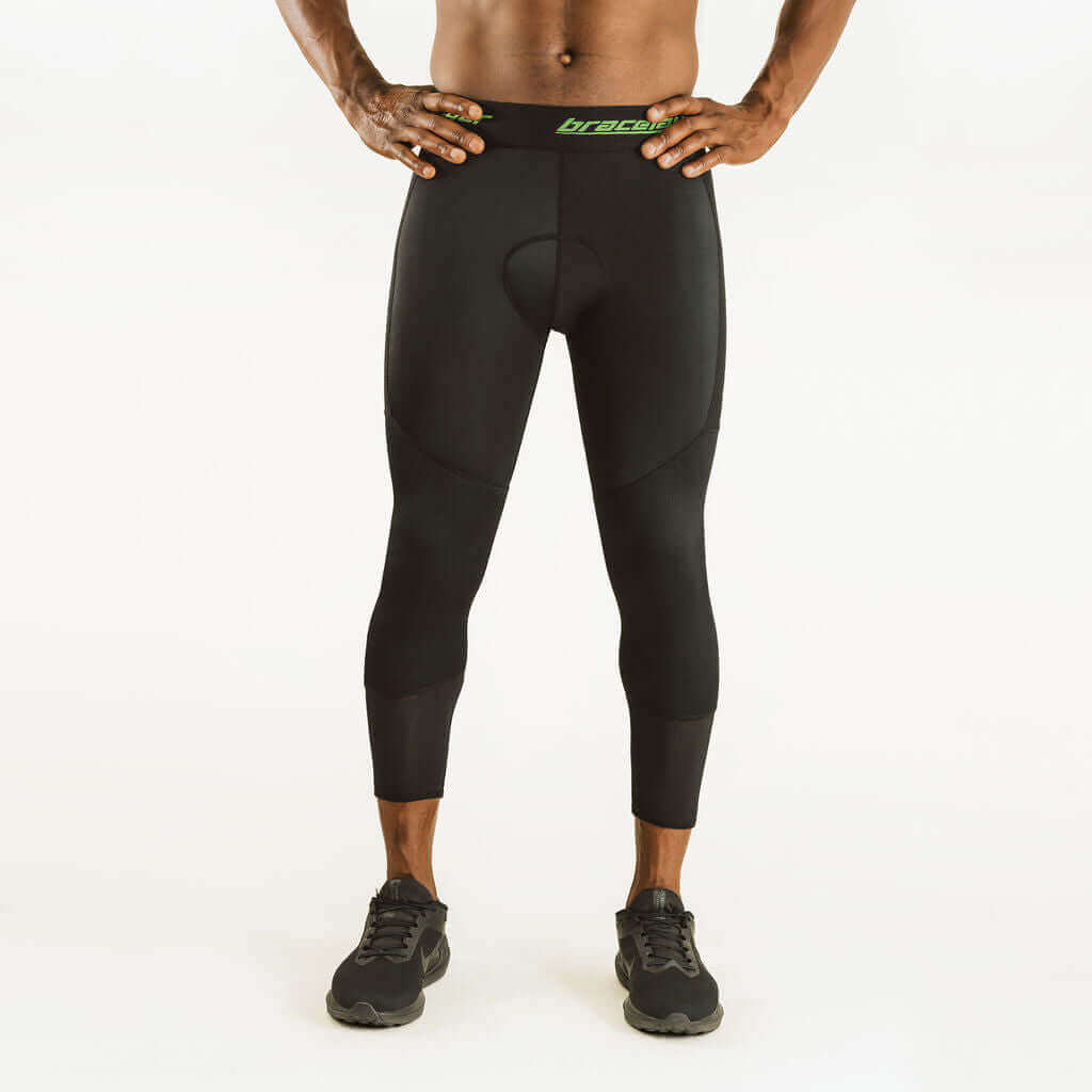 7/8 cycling compression pants with knee support, black rear view with logo