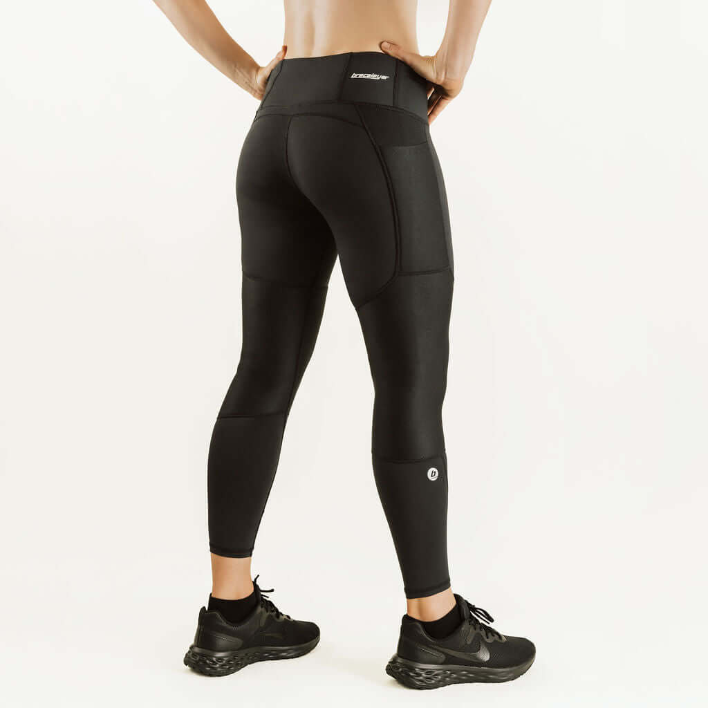 Black knee support compression leggings, full-length with contoured knee design.