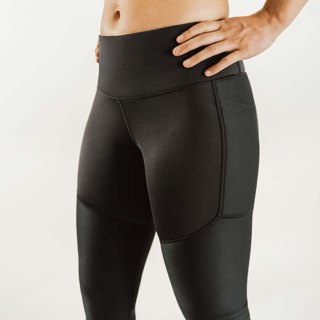 Black 7/8 knee support compression pants with contoured leg panels