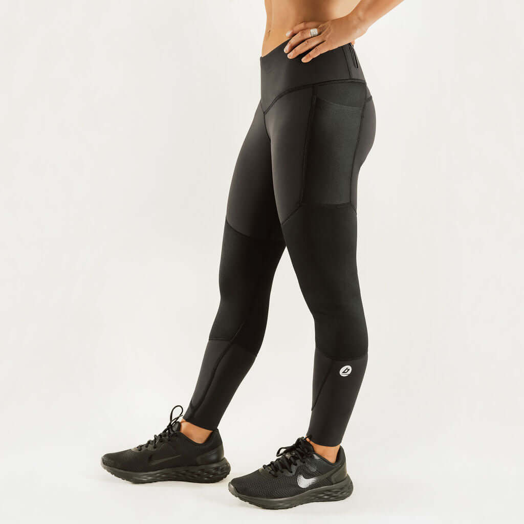 Black knee support compression leggings with contoured side panels.