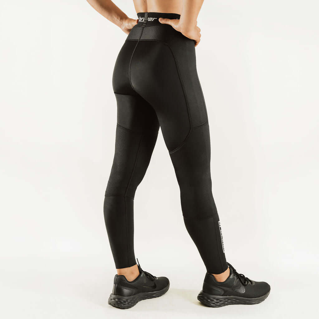 Black compression knee support pants with contoured knee panels and waistband logo.